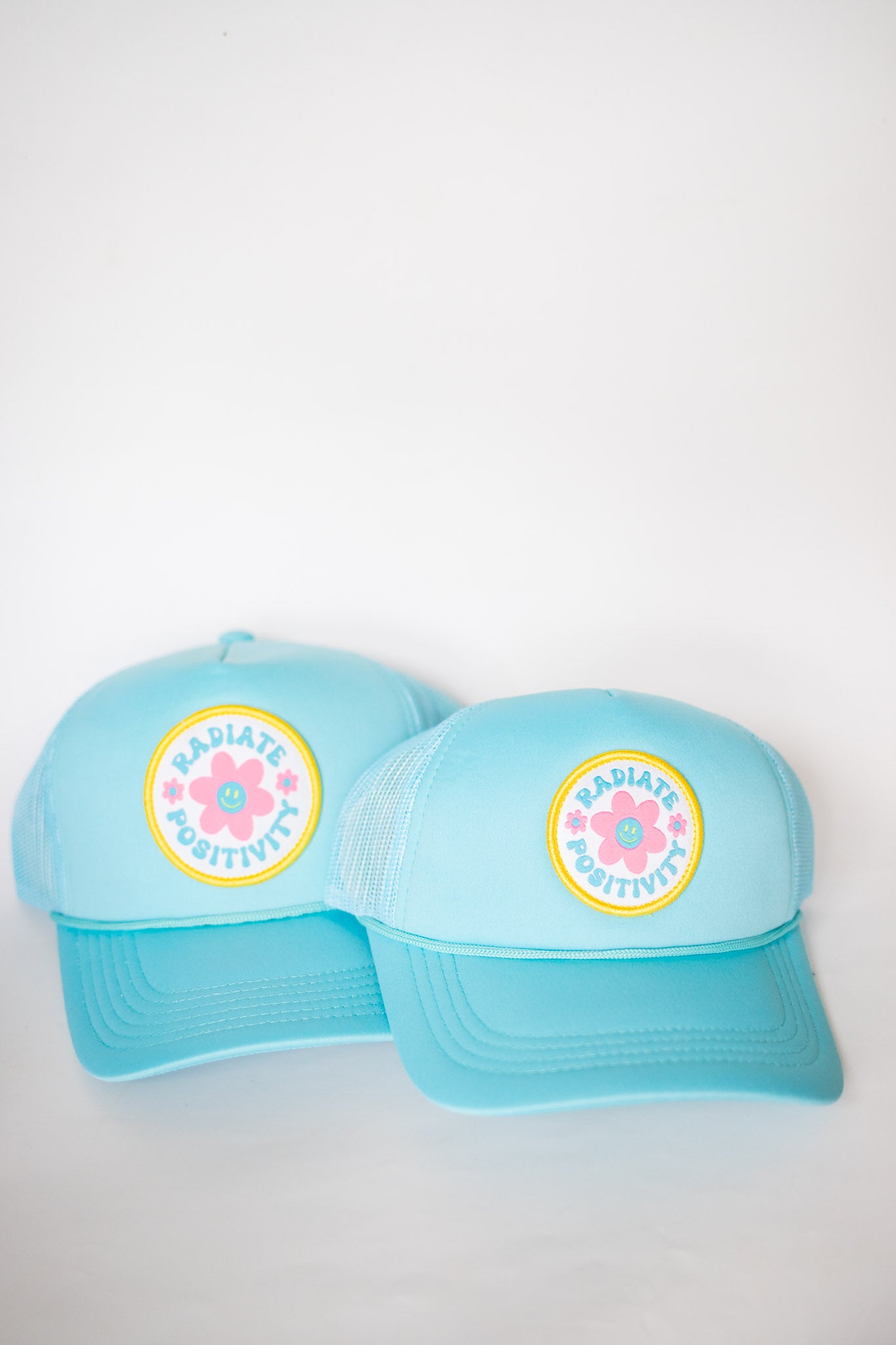XOXO by magpies | Radiate Positivity Trucker Hat | Adult