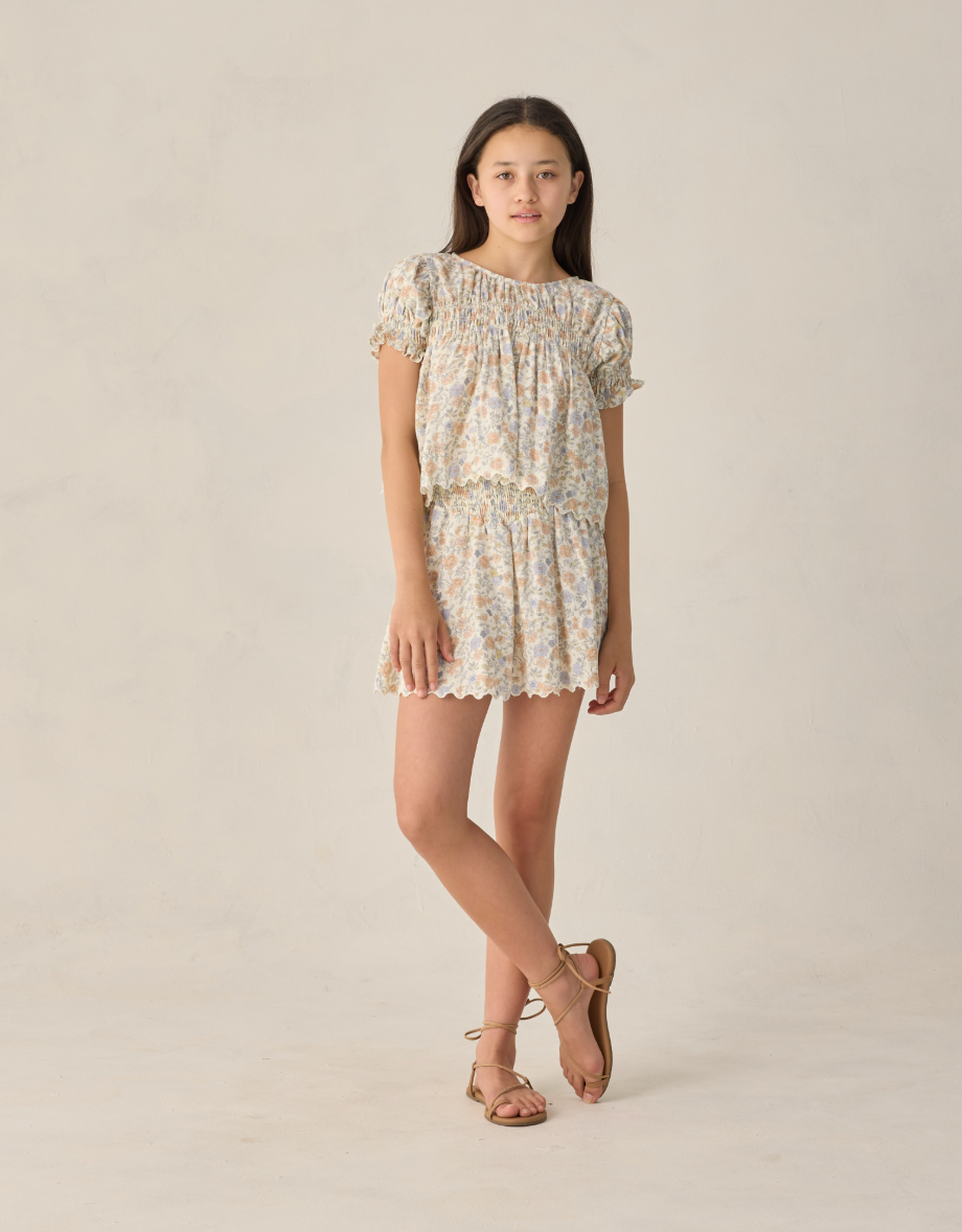 TEEN SMOCKED V MINI SKIRT BLOOM