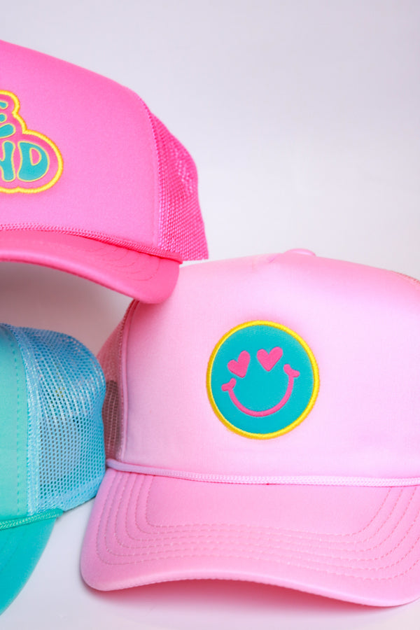 XOXO by magpies | Bubblegum Pink Smiley Trucker