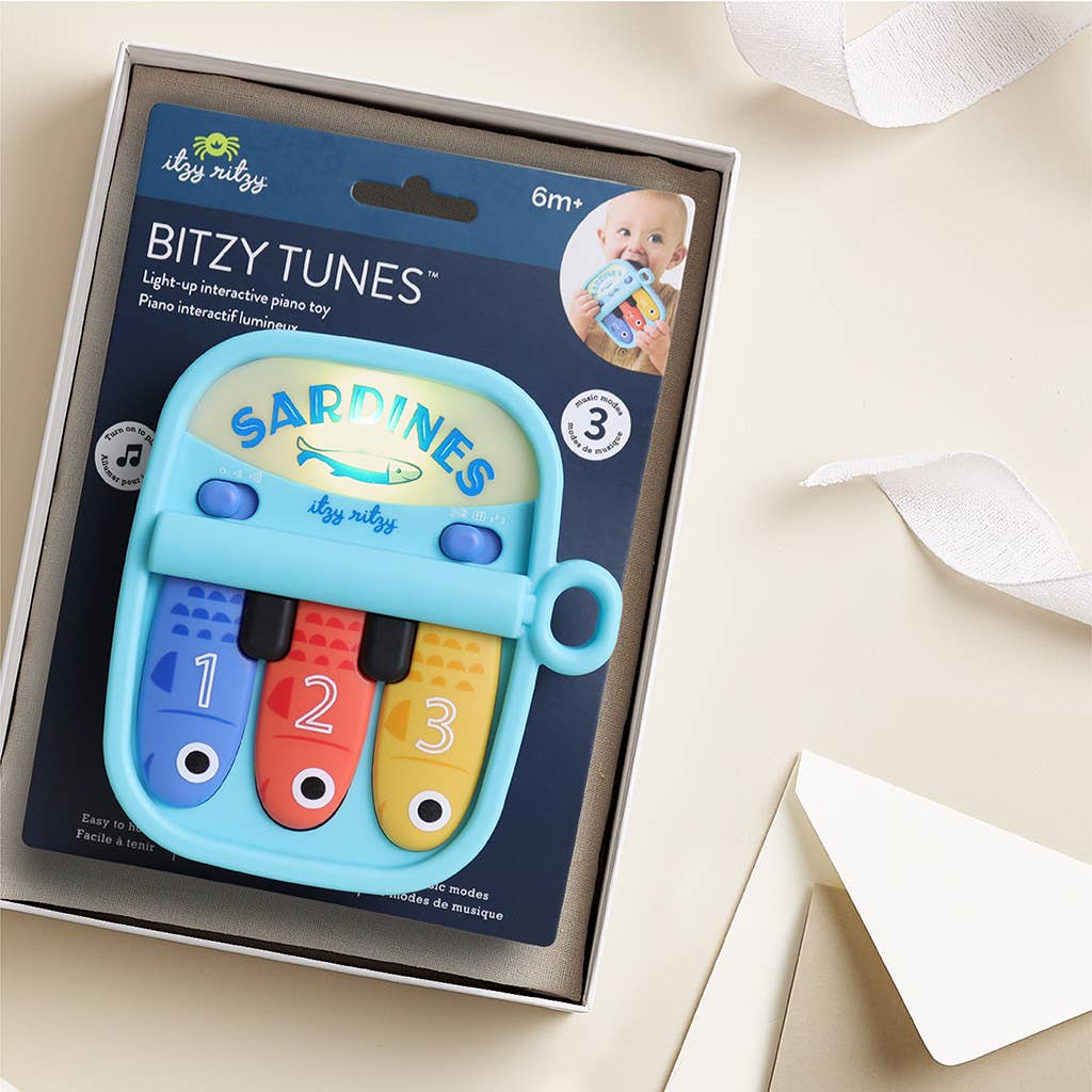 Bitzy Tunes Light-up Interactive Piano Toy | Sardines