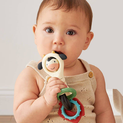 Itzy Spinner™ | Sensory Teething Rattle  | Carmen the Cow